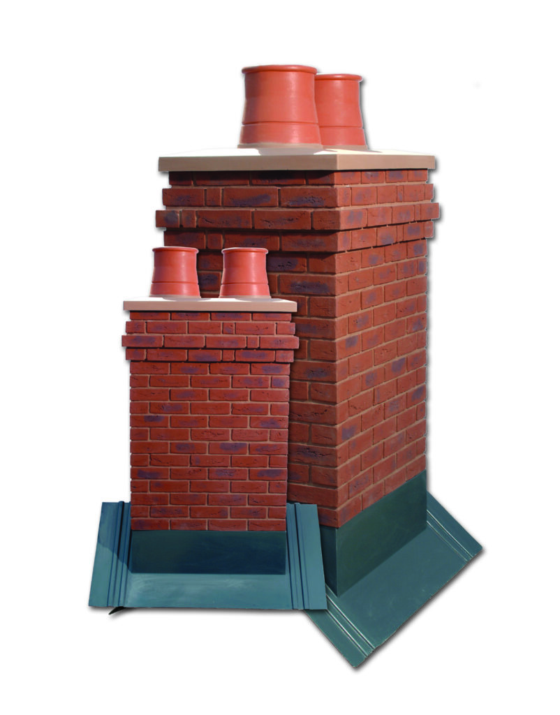 A small and large dual flue lightweight red and grey brick chimney with a beige top